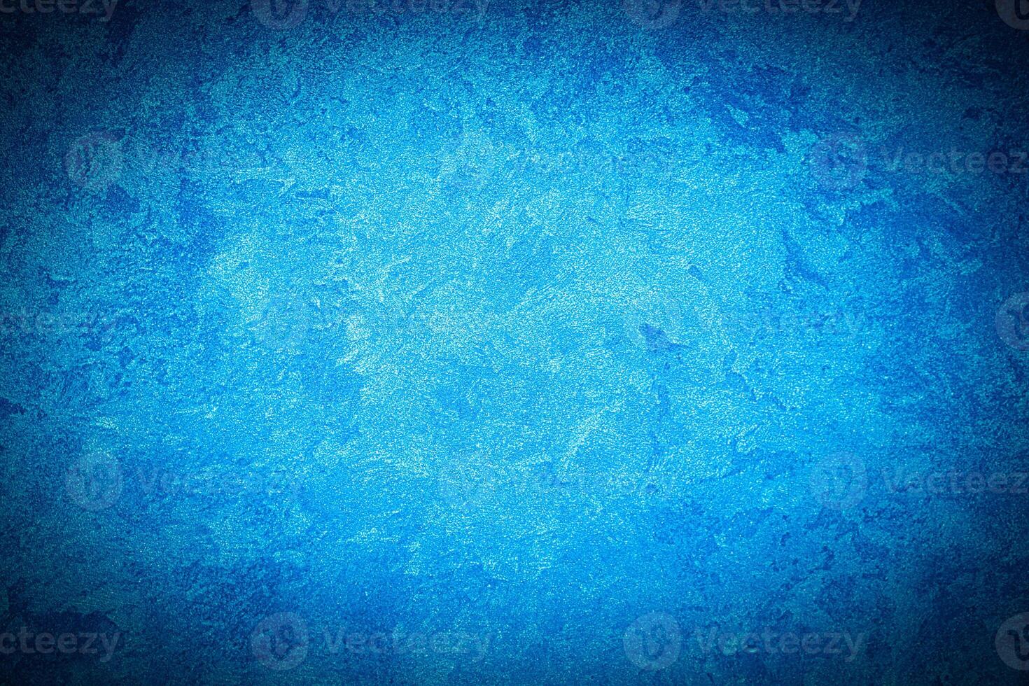 Texture of blue decorative plaster or concrete with vignette. photo