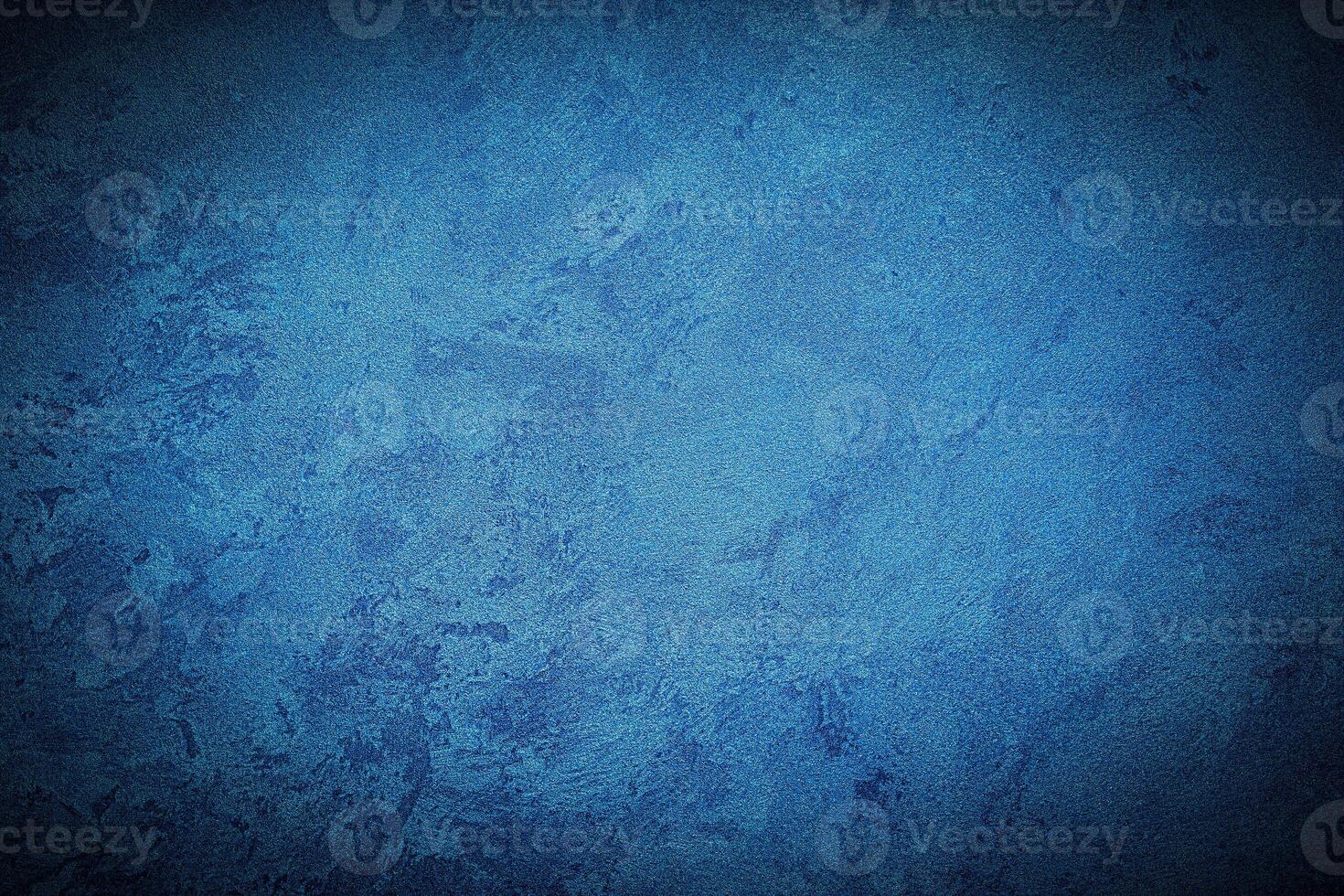 Texture of blue decorative plaster or concrete with vignette. photo