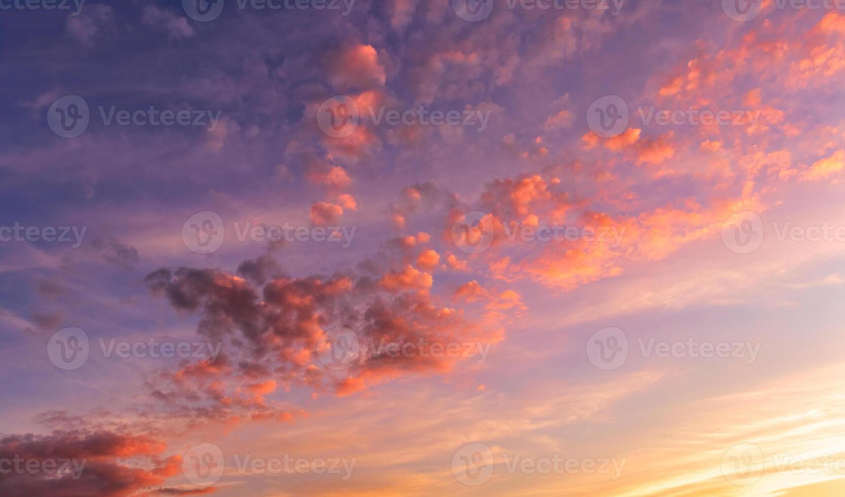 Dramatic cloudy sky at sunset or sunrise. photo