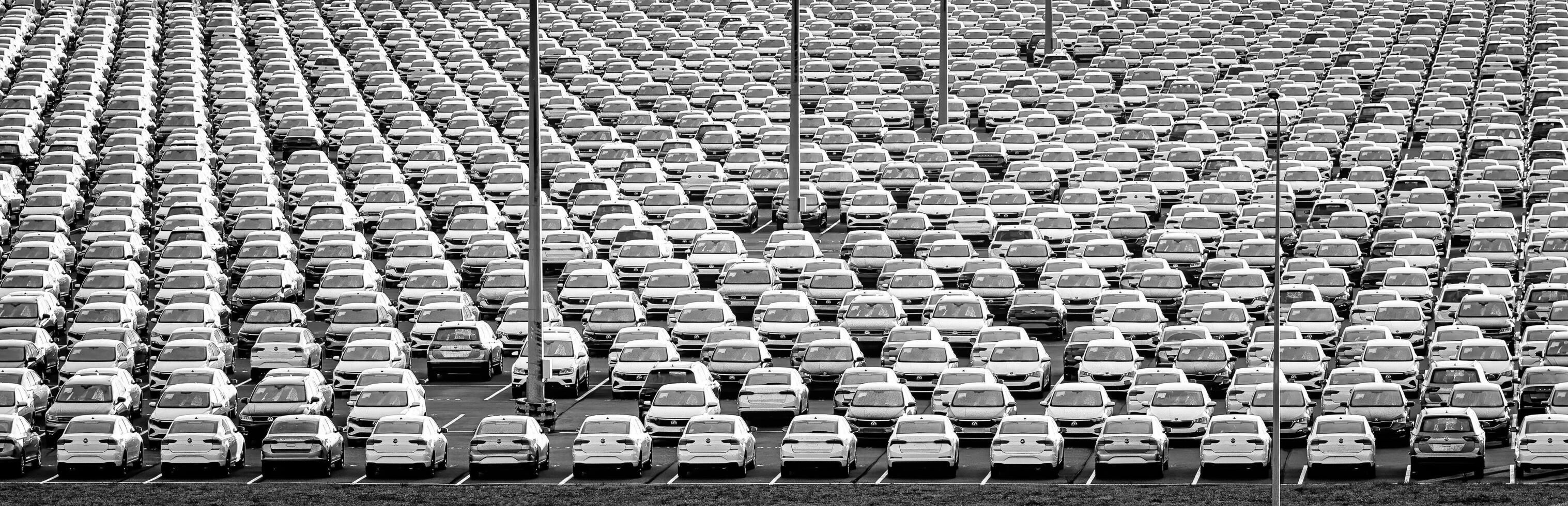 Volkswagen Group Rus, Russia, Kaluga - NOVEMBER 17, 2020 Rows of a new cars parked in a distribution center. Parking in the open air. photo