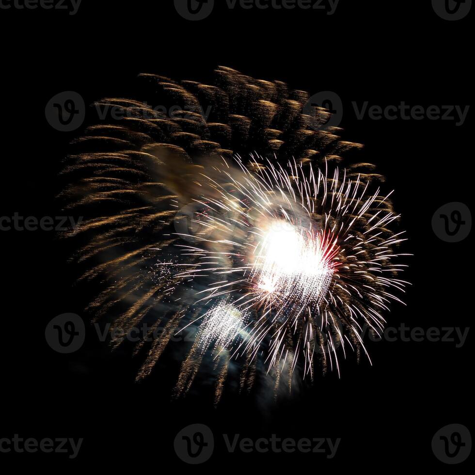 Colorful celebration fireworks isolated on black sky background. photo