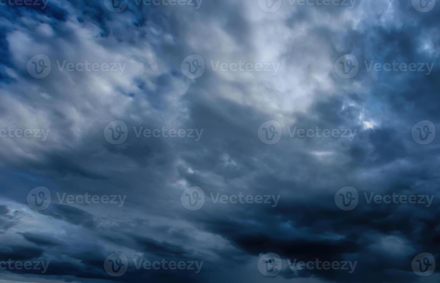 Dark storm clouds. An impending storm, hurricane or thunderstorm. Bad extrime weather. photo