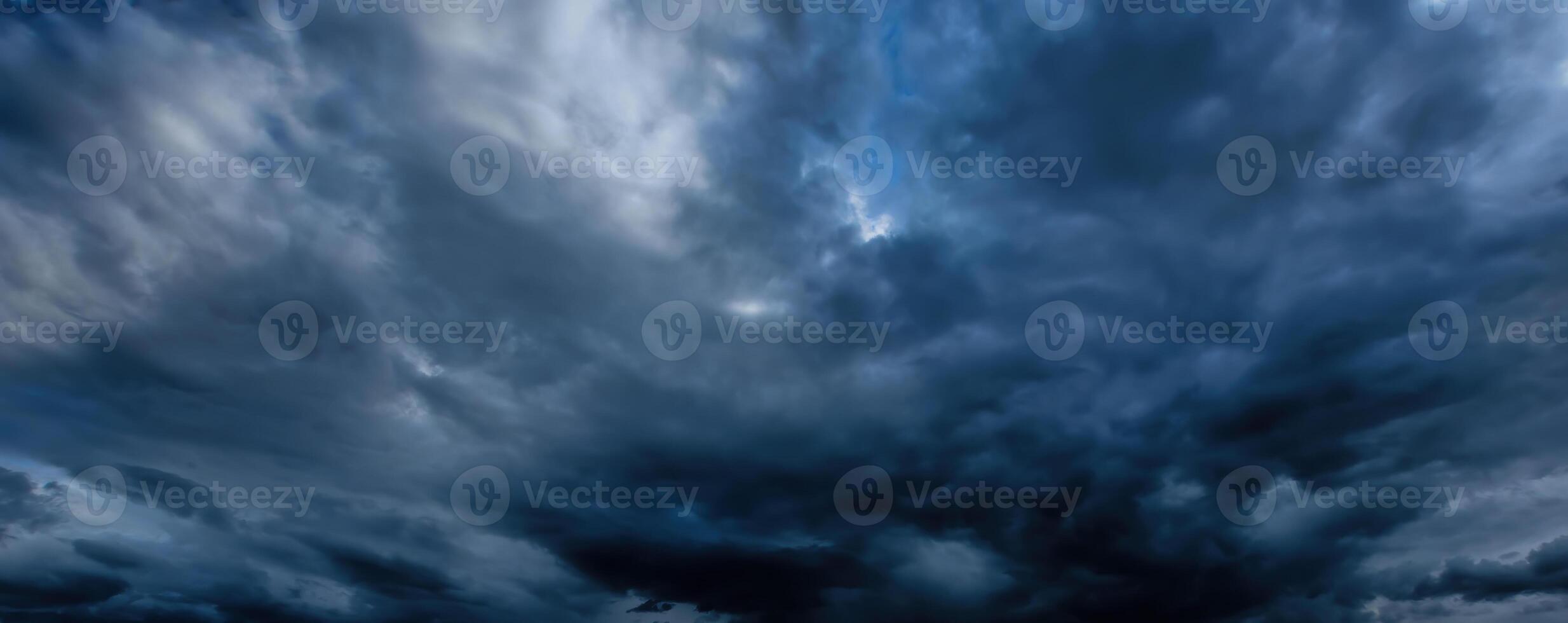 Dark storm clouds. An impending storm, hurricane or thunderstorm. Bad extrime weather. photo