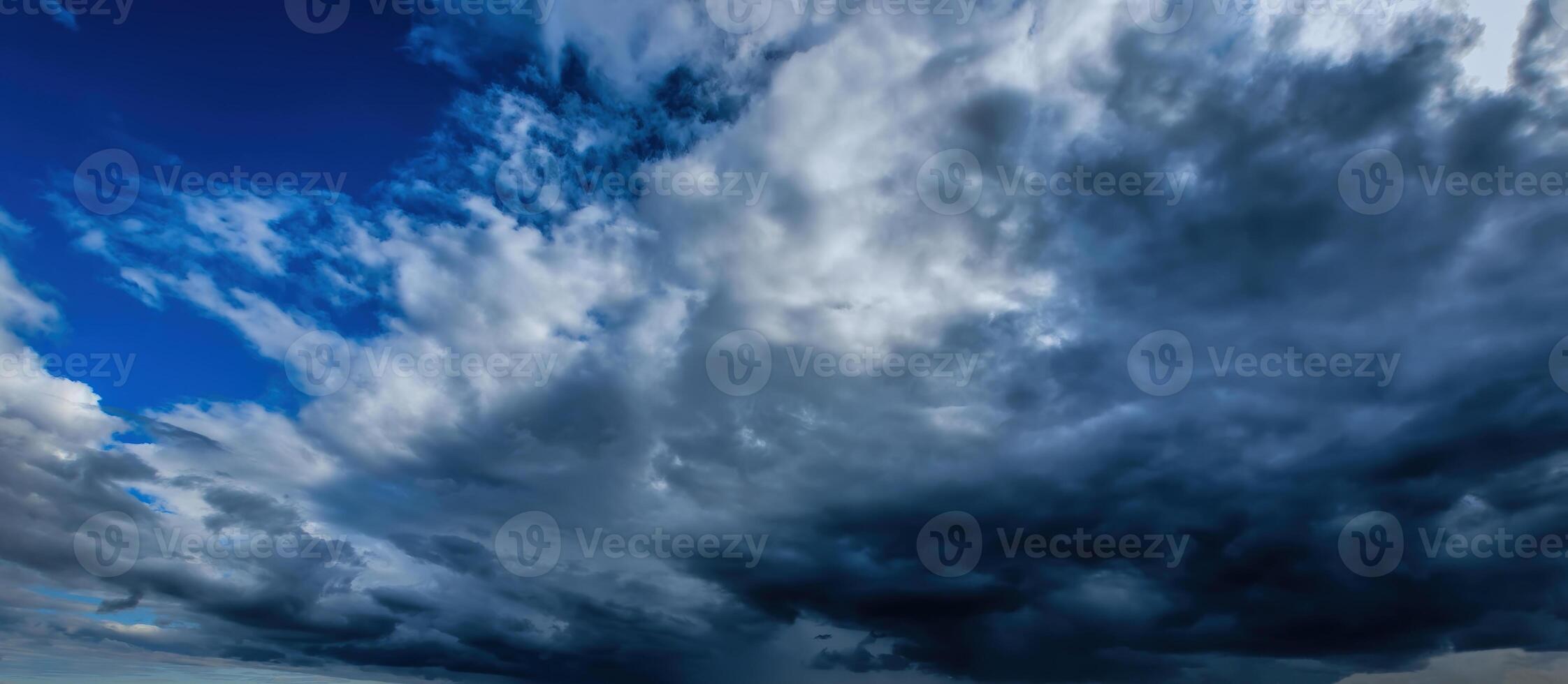 Dark storm clouds. An impending storm, hurricane or thunderstorm. Bad extrime weather. photo