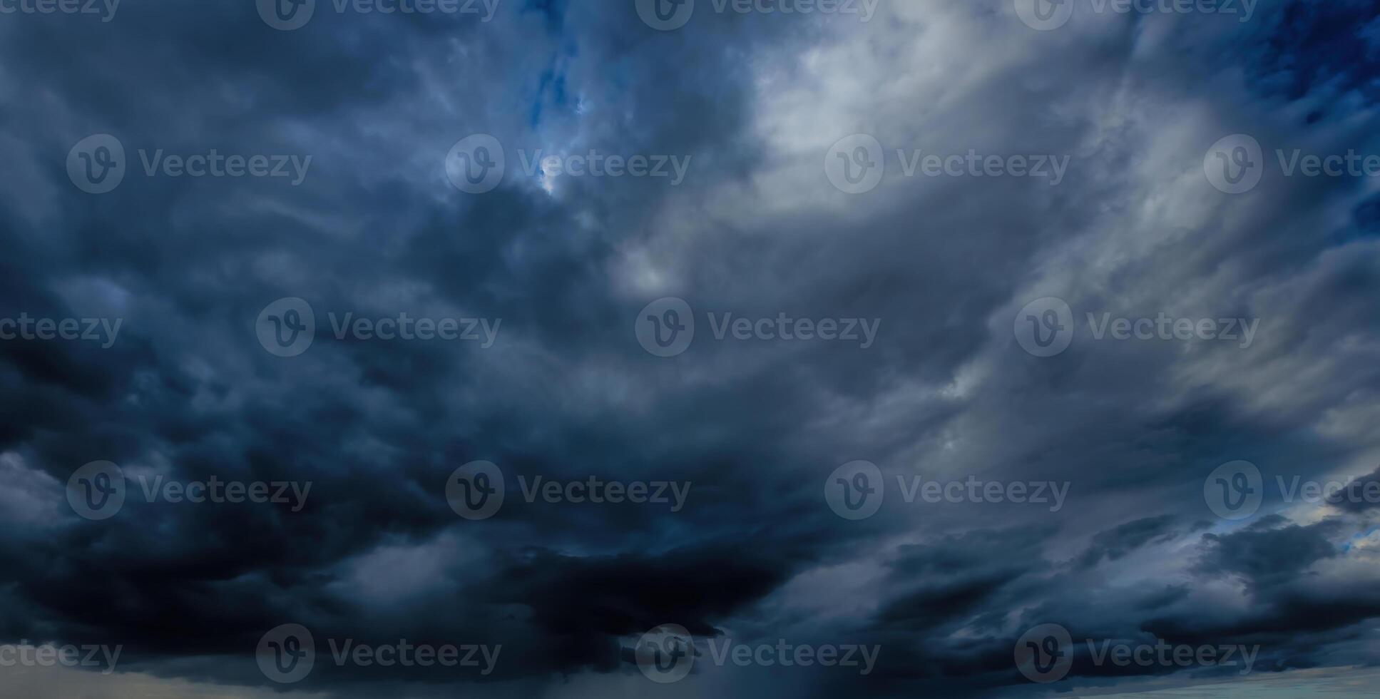 Dark storm clouds. An impending storm, hurricane or thunderstorm. Bad extrime weather. photo