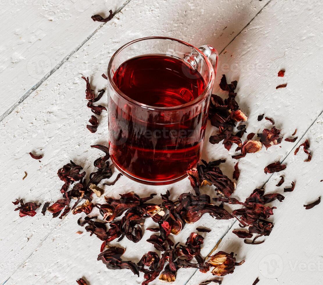 Cup of Karkadeh Red Tea with Dry Flowers 46214958 Stock Photo at Vecteezy