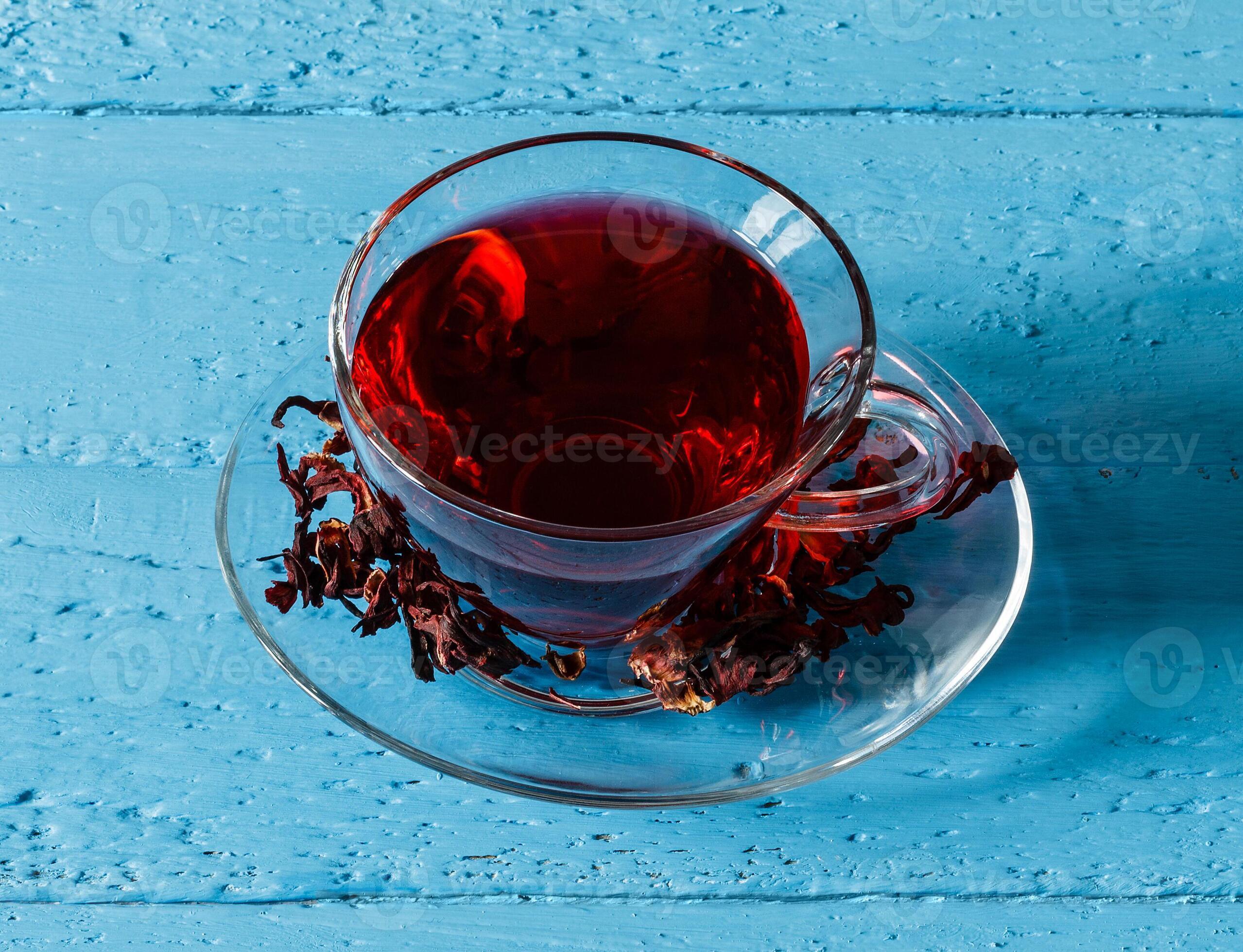 Cup of Karkadeh Red Tea with Dry Flowers 46214973 Stock Photo at Vecteezy