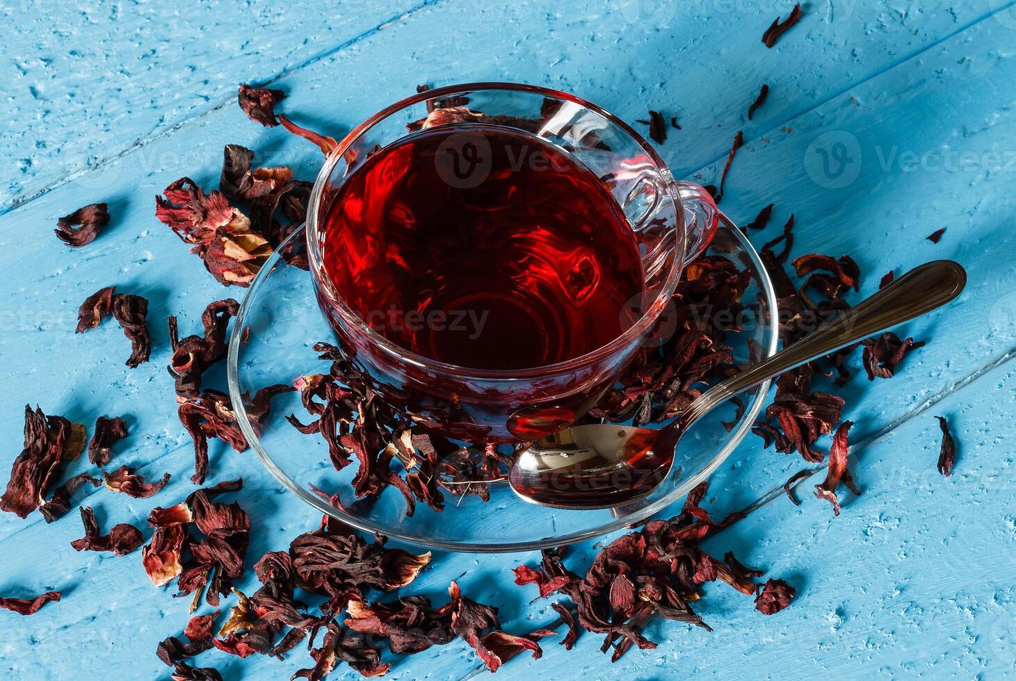 Cup of Karkadeh Red Tea with Dry Flowers photo