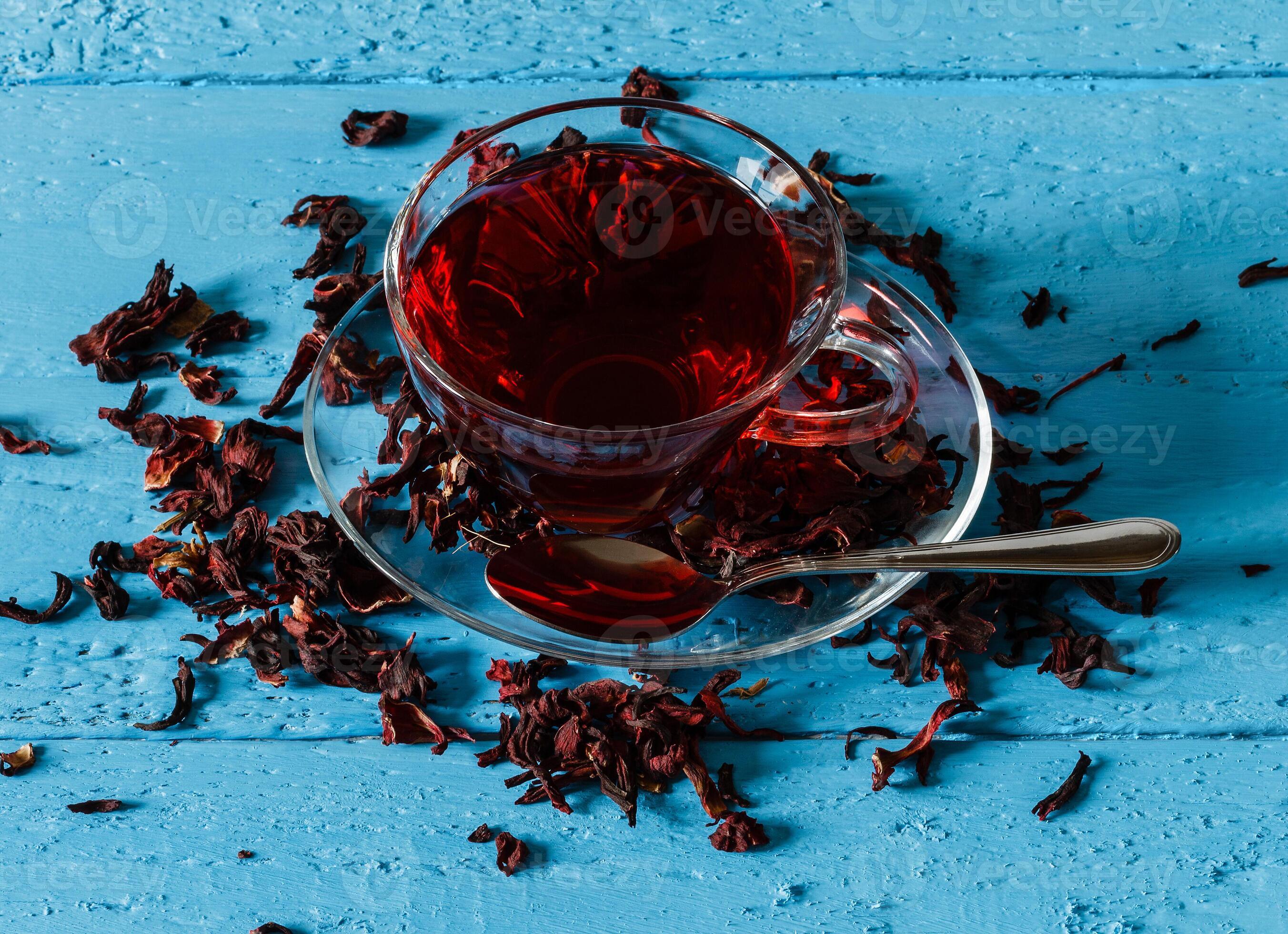 Cup of Karkadeh Red Tea with Dry Flowers 46214995 Stock Photo at Vecteezy