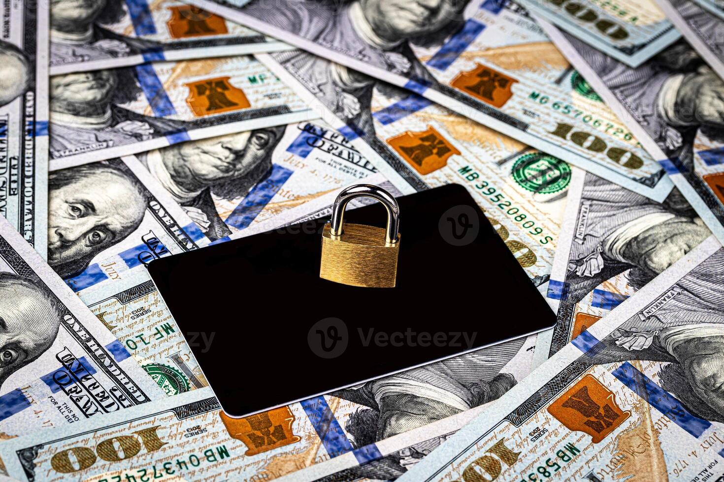 Dollar bills and white debit card with copy space for a text. photo