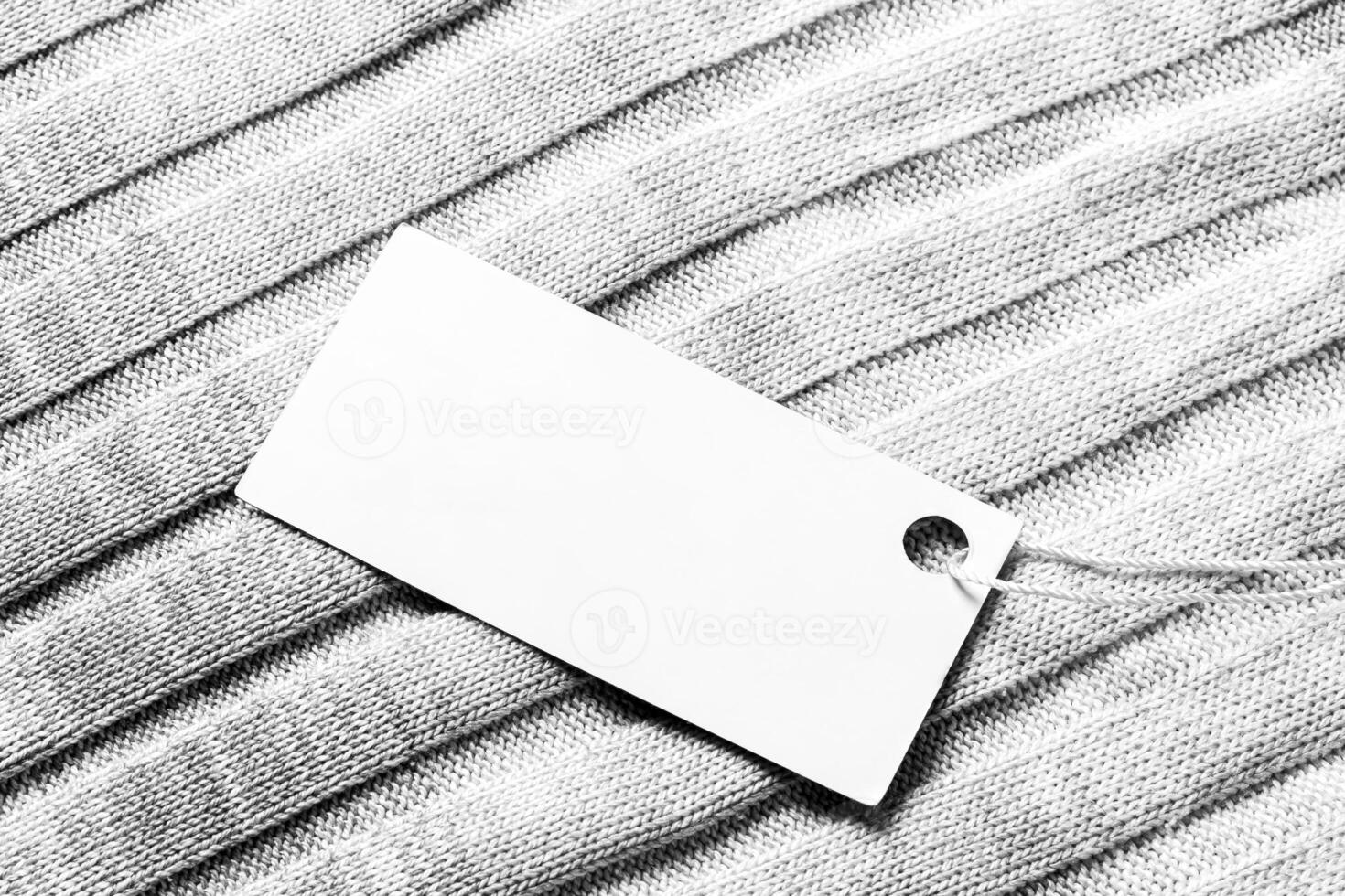 White label on a woolen fabric. Abstract background for design. Art stylized baner or mock up with copy space. photo