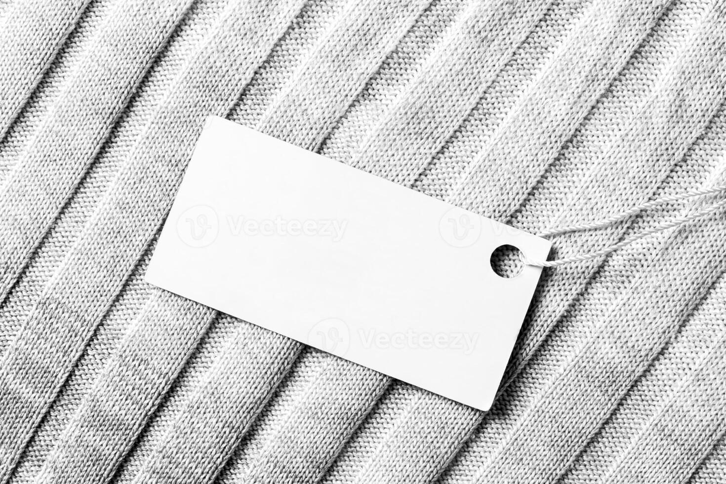 White label on a woolen fabric. Abstract background for design. Art stylized baner or mock up with copy space. photo