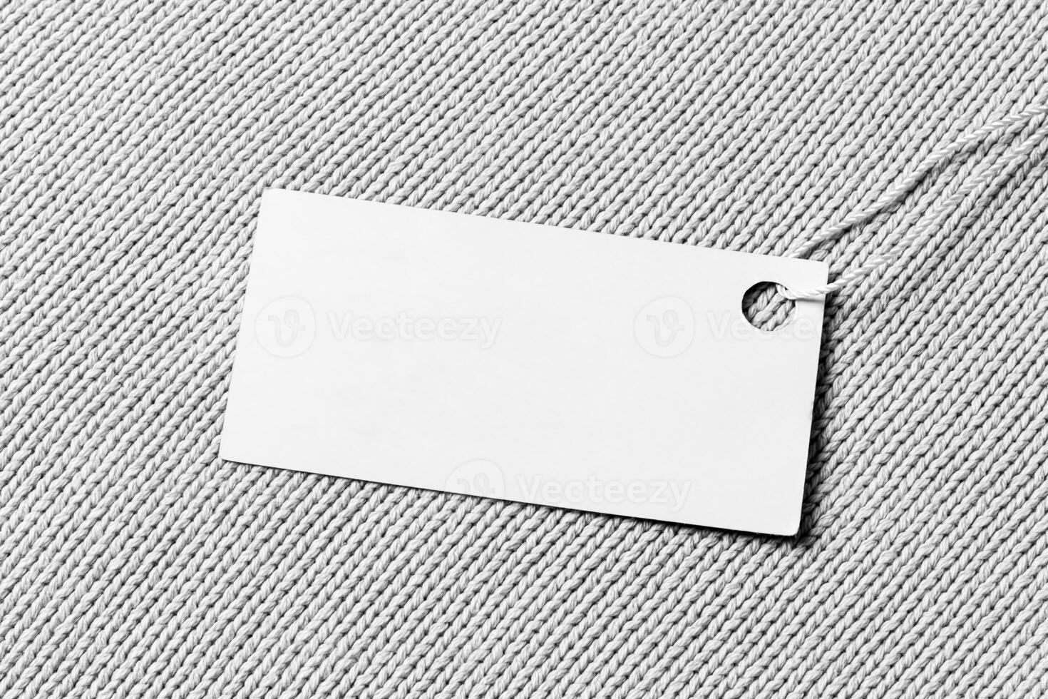 White label on a woolen fabric. Abstract background for design. Art stylized baner or mock up with copy space. photo