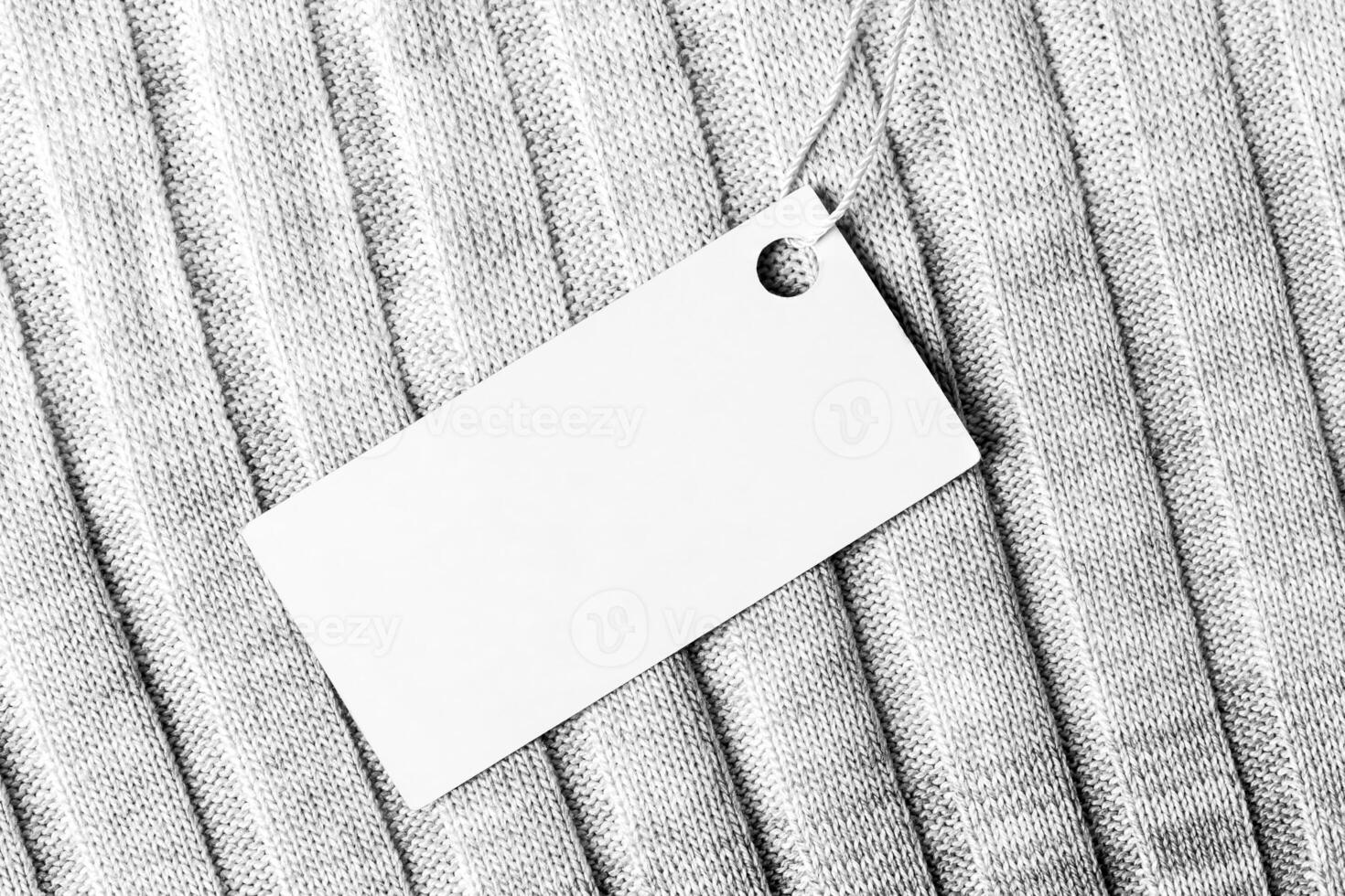 White label on a woolen fabric. Abstract background for design. Art stylized baner or mock up with copy space. photo