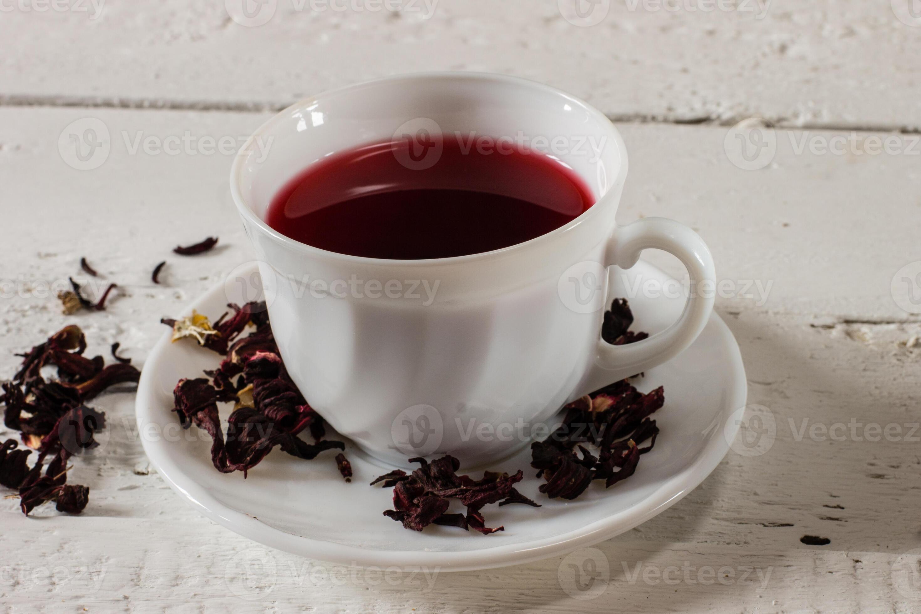 Cup of Karkadeh Red Tea with Dry Flowers 46215899 Stock Photo at Vecteezy