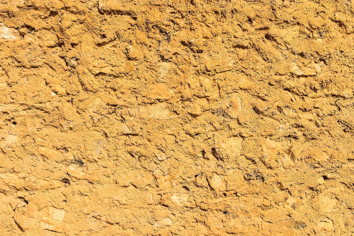 Background of ancient stone wall. Texture of old brick. photo