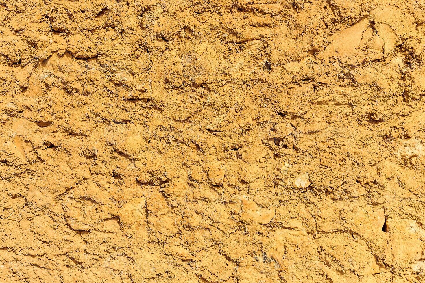 Background of ancient stone wall. Texture of old brick. photo