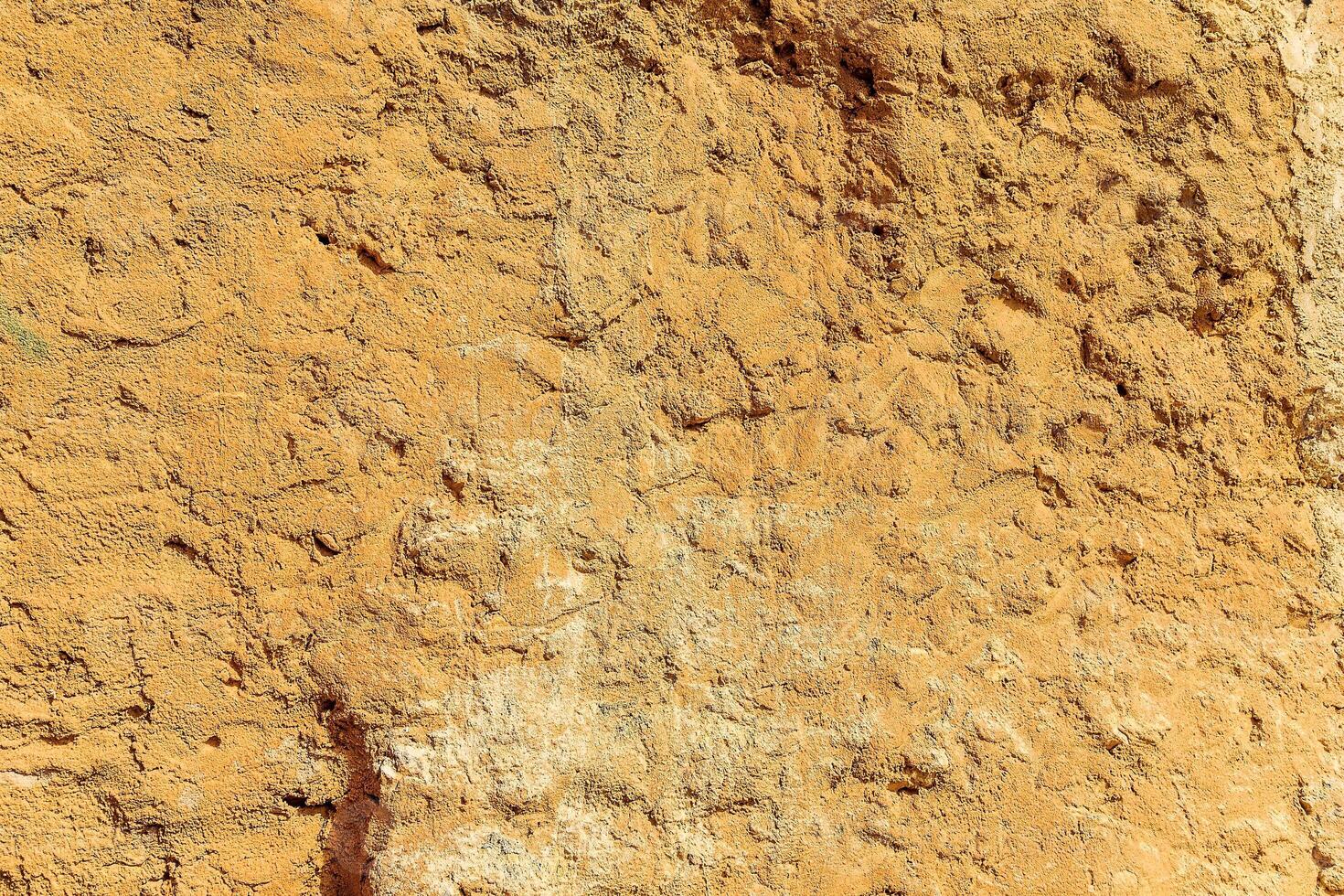 Background of ancient stone wall. Texture of old brick. photo