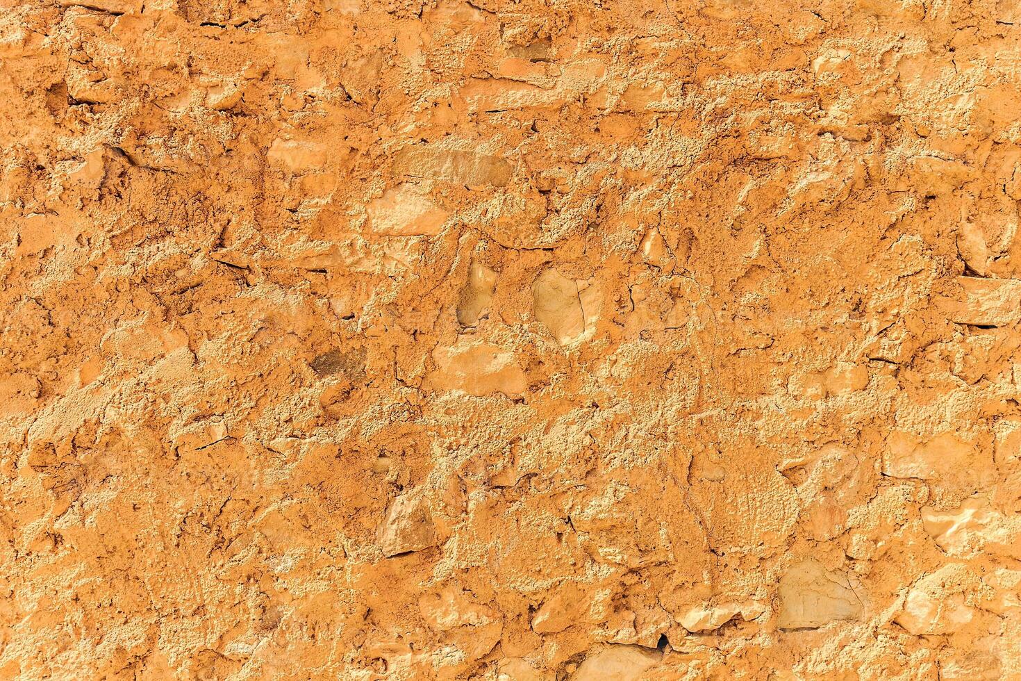 Background of ancient stone wall. Texture of old brick. photo
