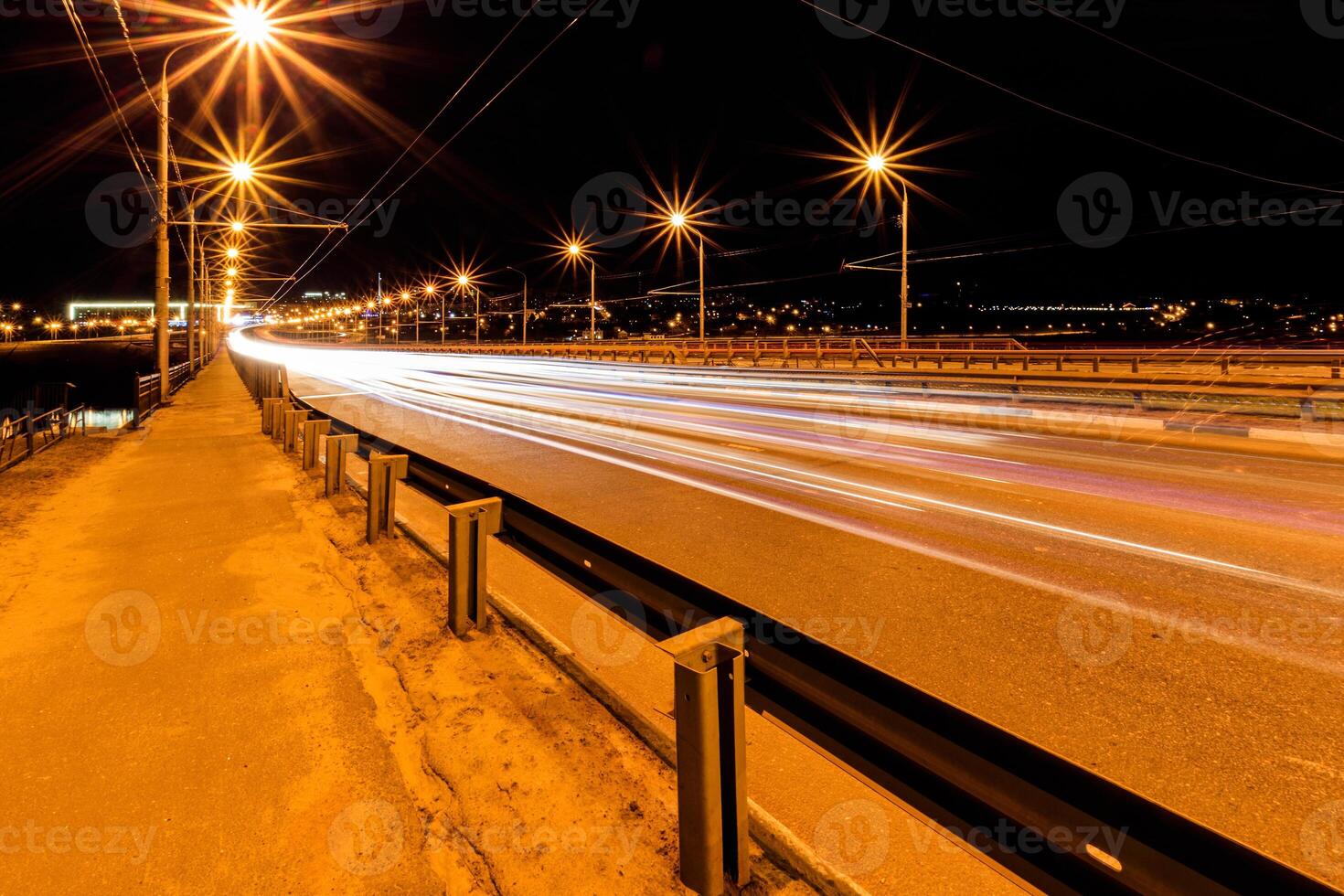 Moving car with blur light through city at night. photo