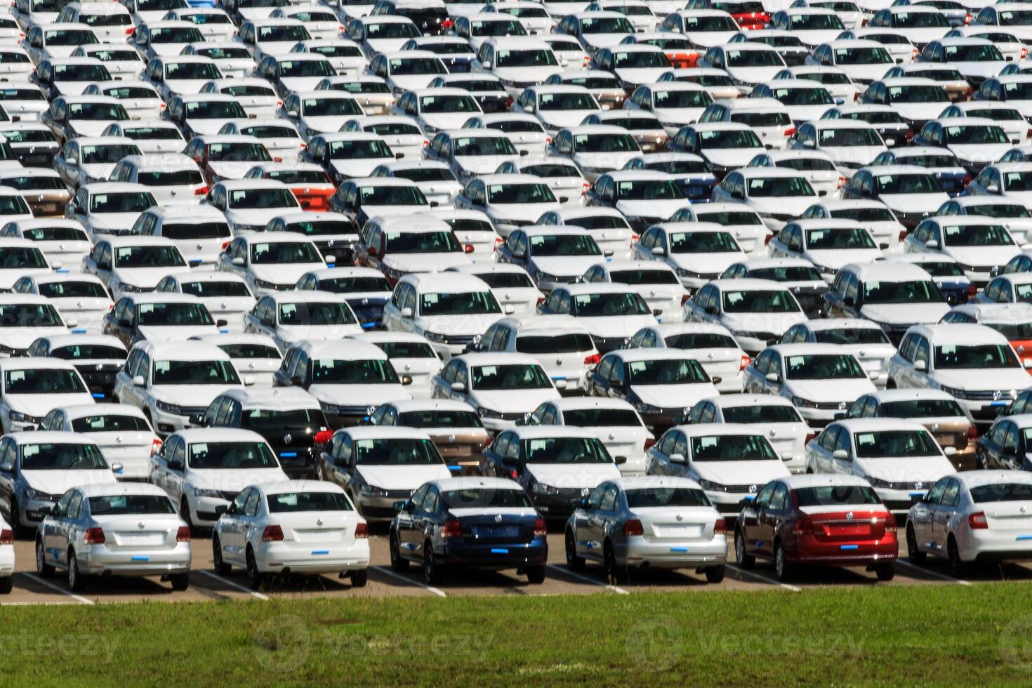 Volkswagen - JUNE 16, 2016 New cars parked at distribution center, auto factory photo