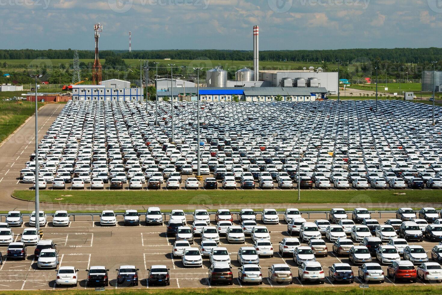 Volkswagen - JUNE 16, 2016 New cars parked at distribution center, auto factory photo