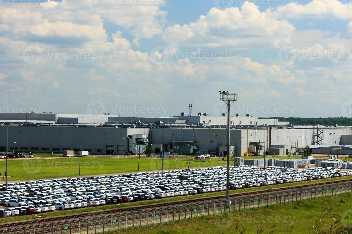 Volkswagen - JUNE 16, 2016 New cars parked at distribution center, auto factory photo