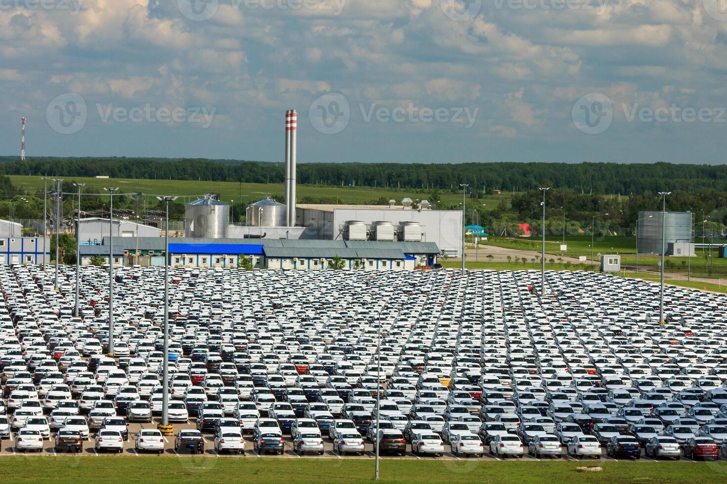 Volkswagen - JUNE 16, 2016 New cars parked at distribution center, auto factory photo