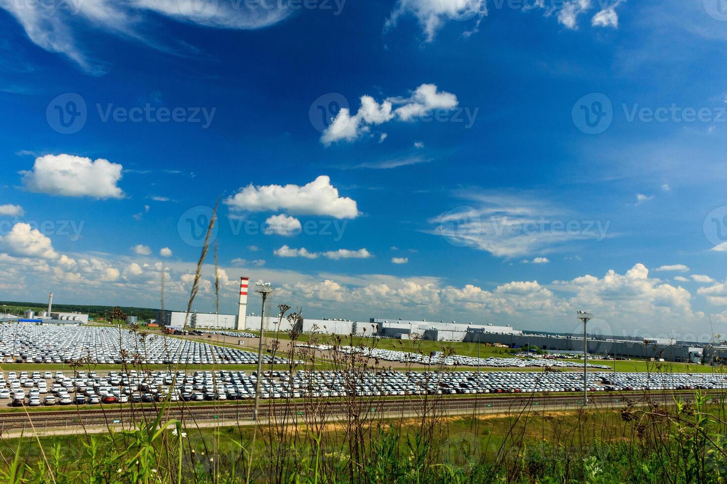 Volkswagen - JUNE 16, 2016 New cars parked at distribution center, auto factory photo