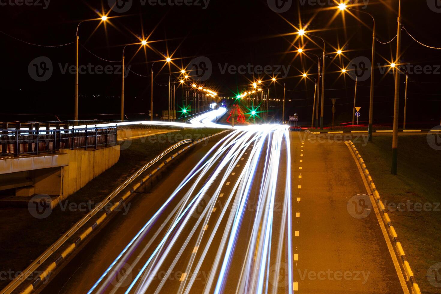 moving car with blur light through city photo