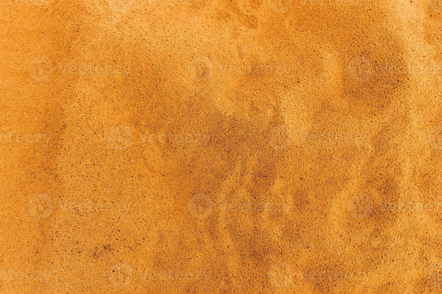 Sandy beach. Detailed sand texture photo
