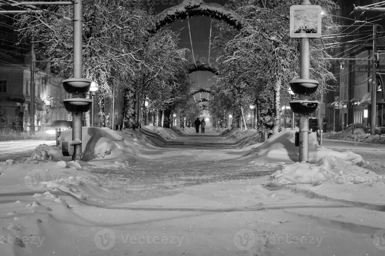 Walk of the city at night in winter. photo