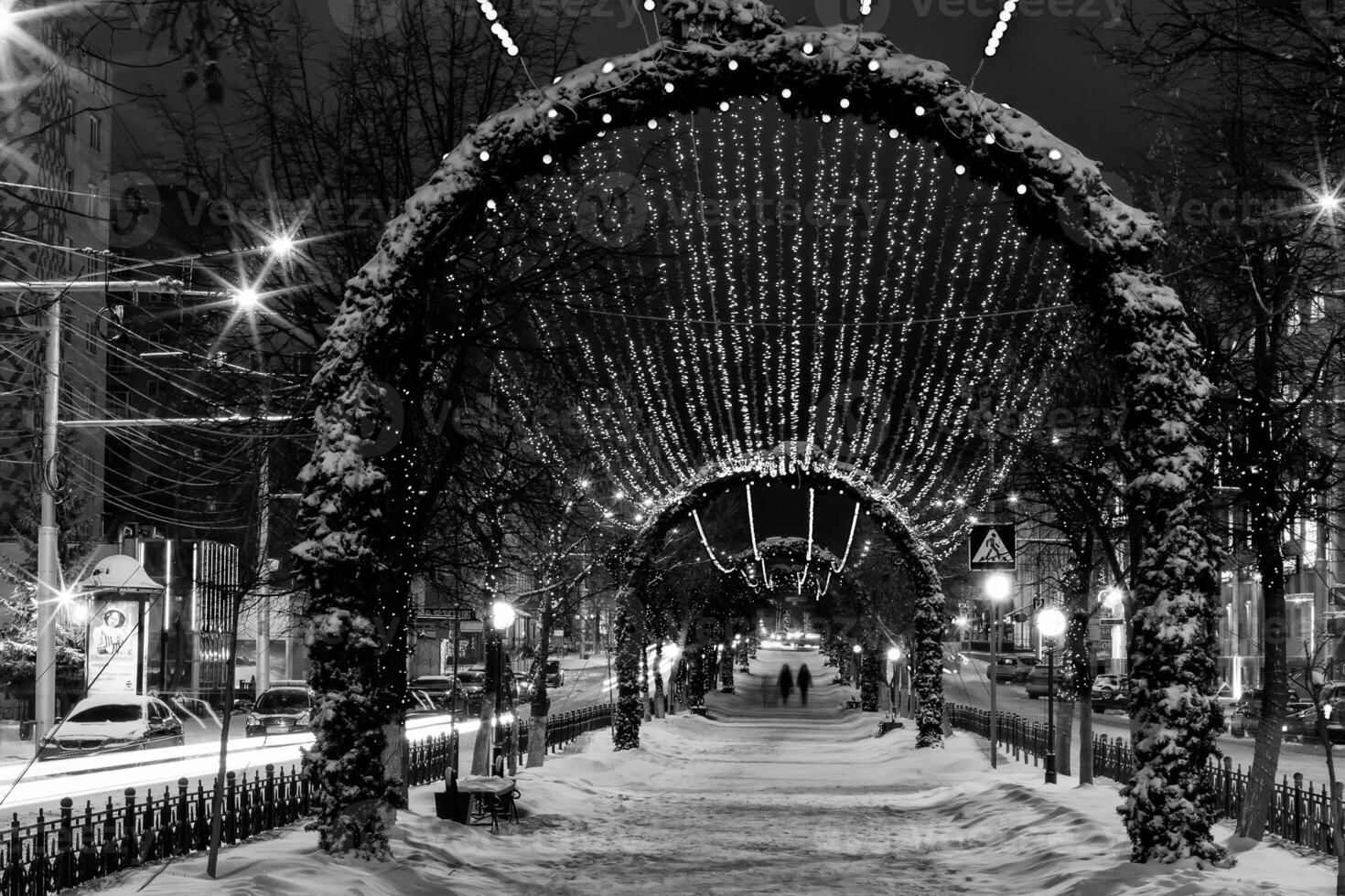 Walk of the city at night in winter. photo
