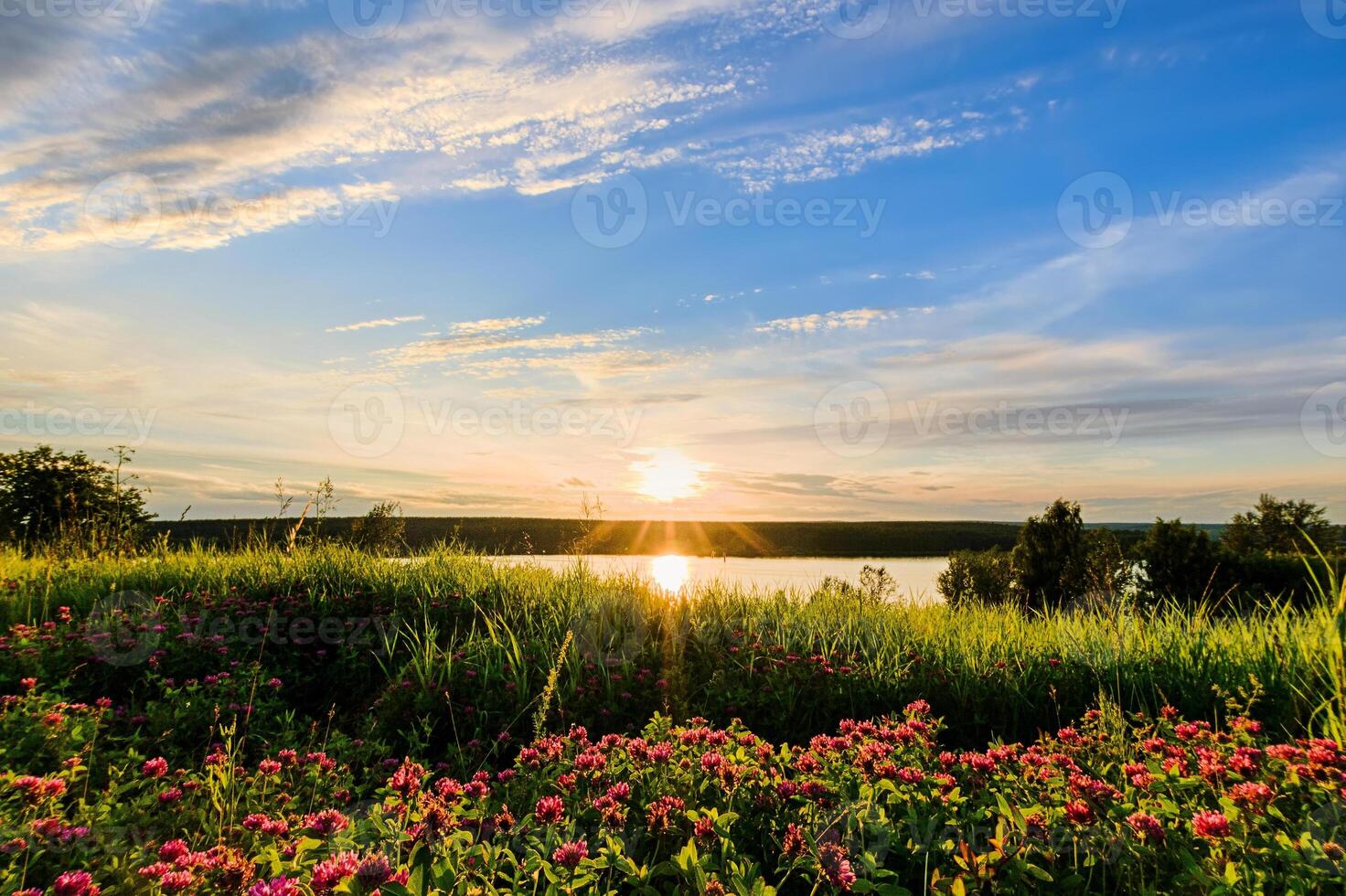 Scenic view of beautiful sunset above the lake. photo
