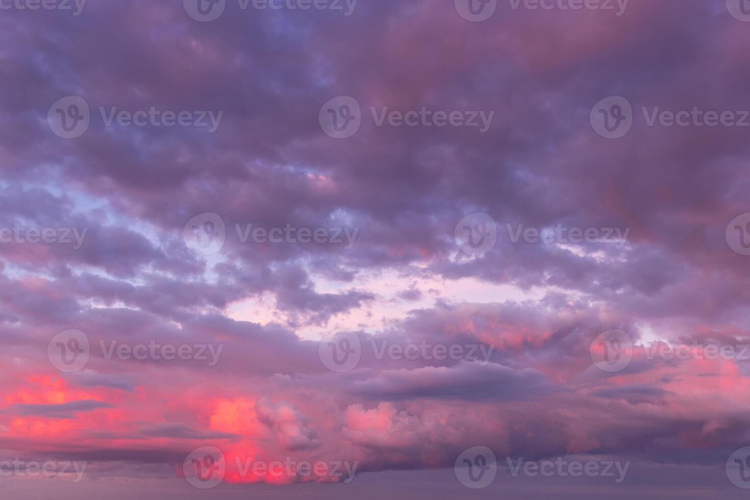 Overcast twilight sky with purple clouds. Abstract background for design. photo