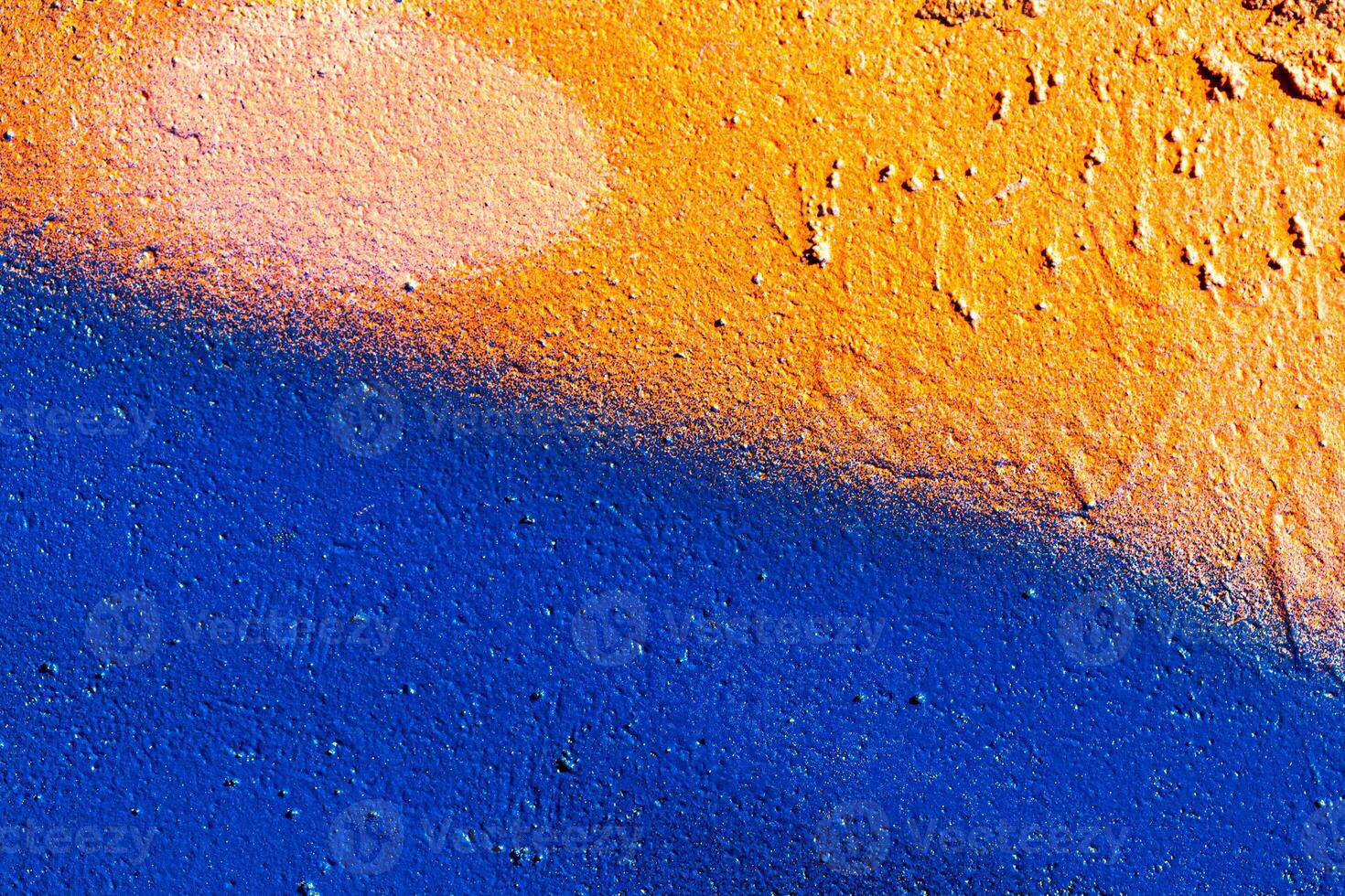 Fragment of colored graffiti painted on a wall. Abstract background for design. photo