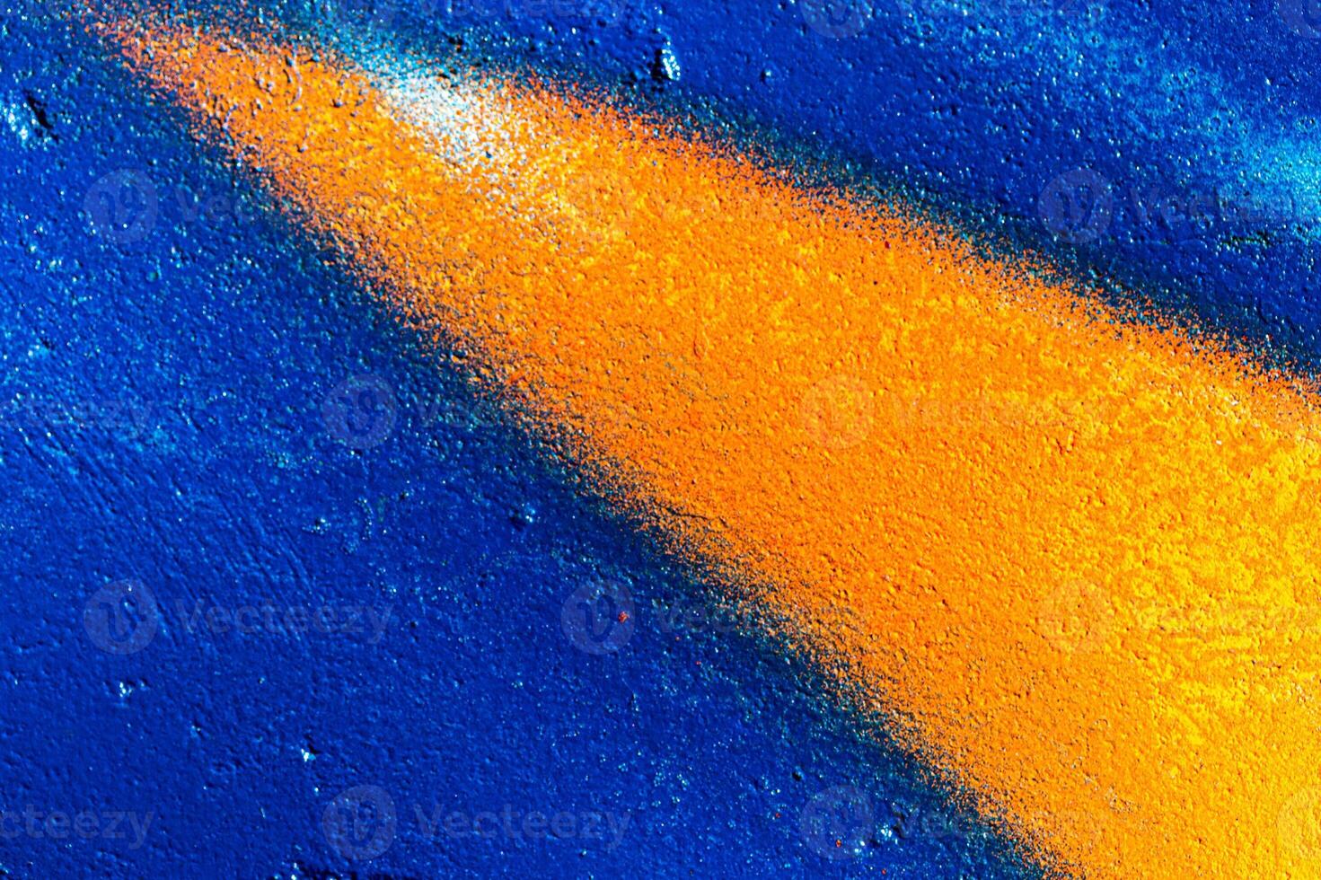 Fragment of colored graffiti painted on a wall. Abstract background for design. photo