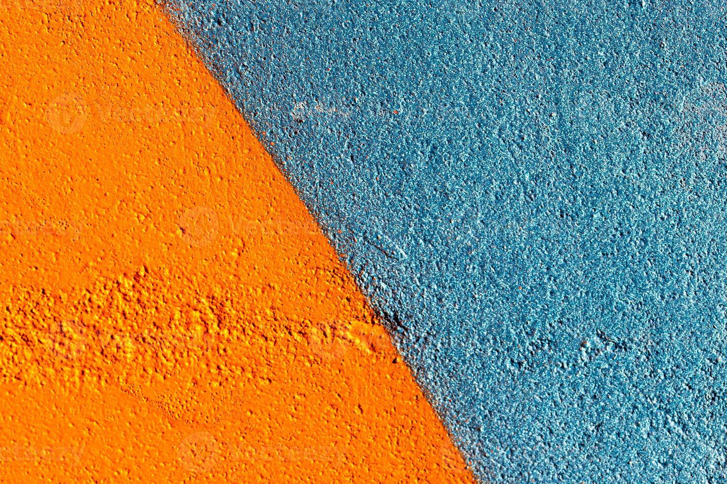 Fragment of colored graffiti painted on a wall. Abstract background for design. photo