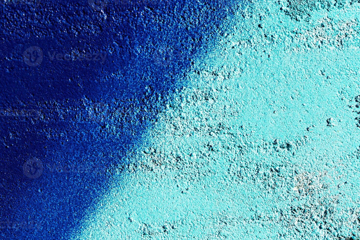 Fragment of colored graffiti painted on a wall. Abstract background for design. photo
