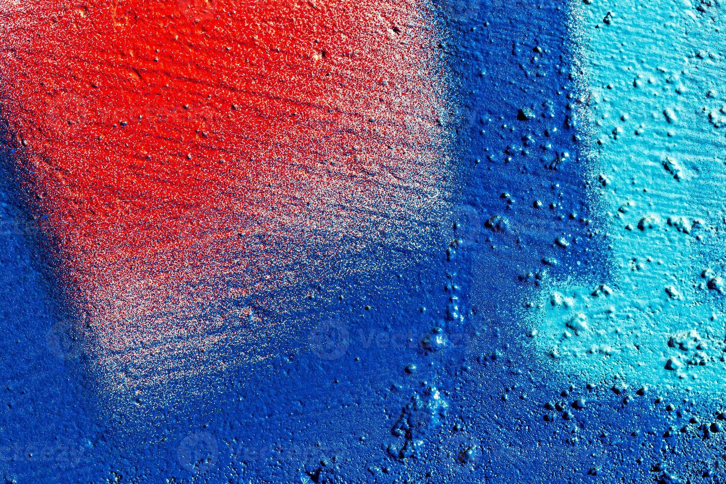 Fragment of colored graffiti painted on a wall. Abstract background for design. photo