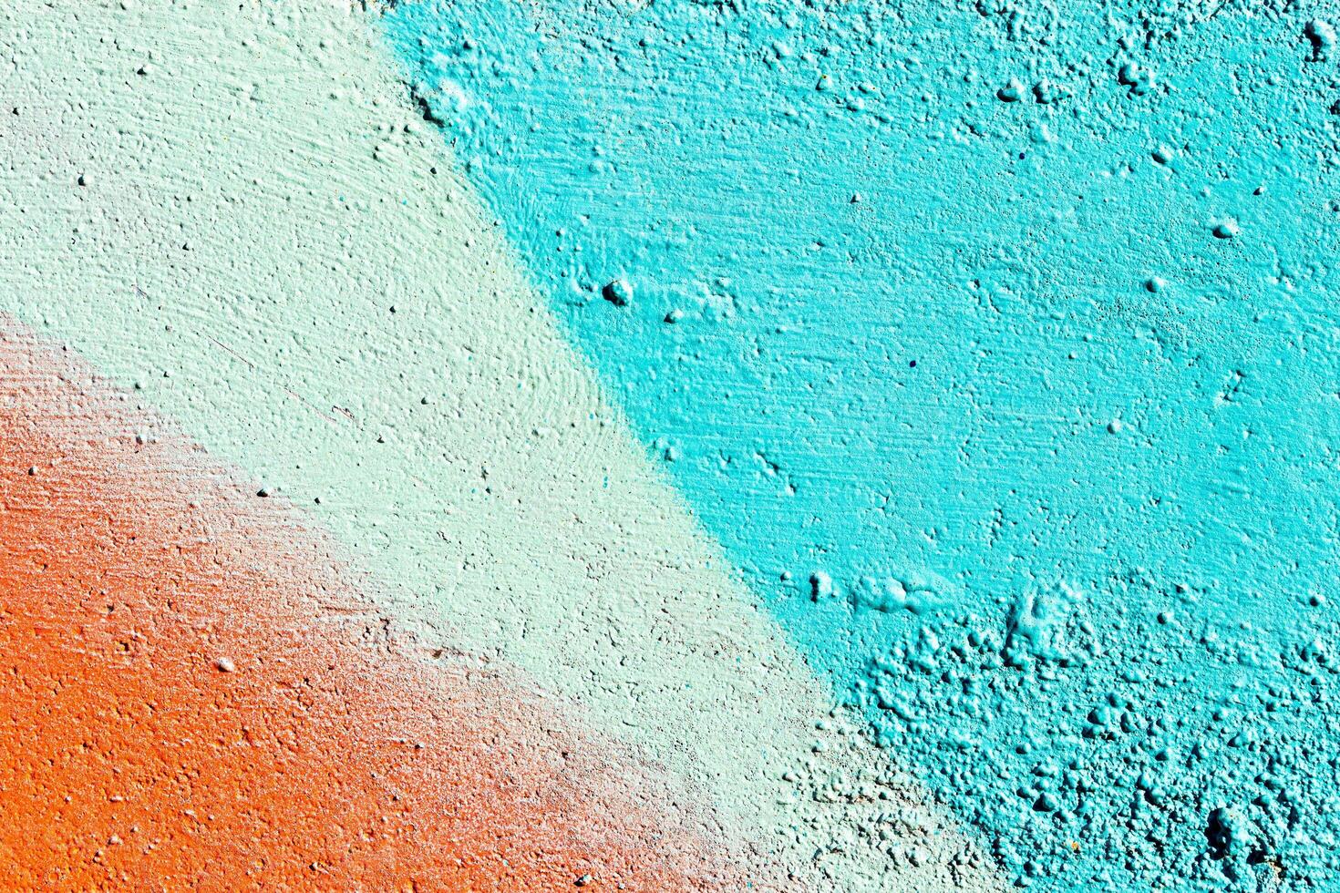 Fragment of colored graffiti painted on a wall. Abstract background for design. photo