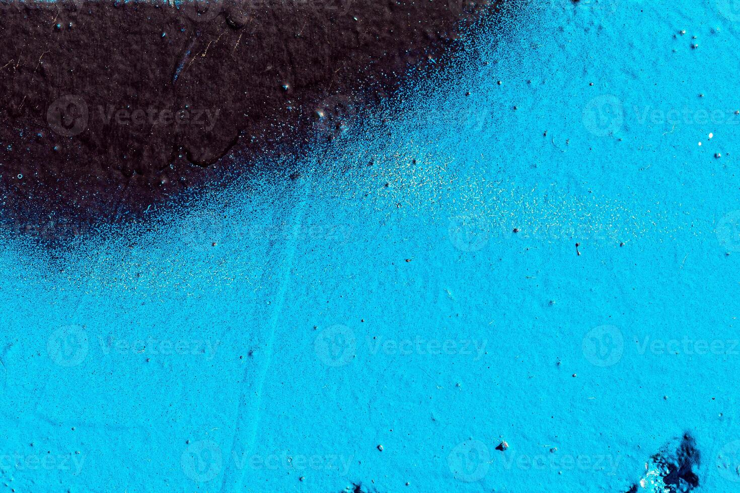 Fragment of colored graffiti painted on a wall. Abstract background for design. photo