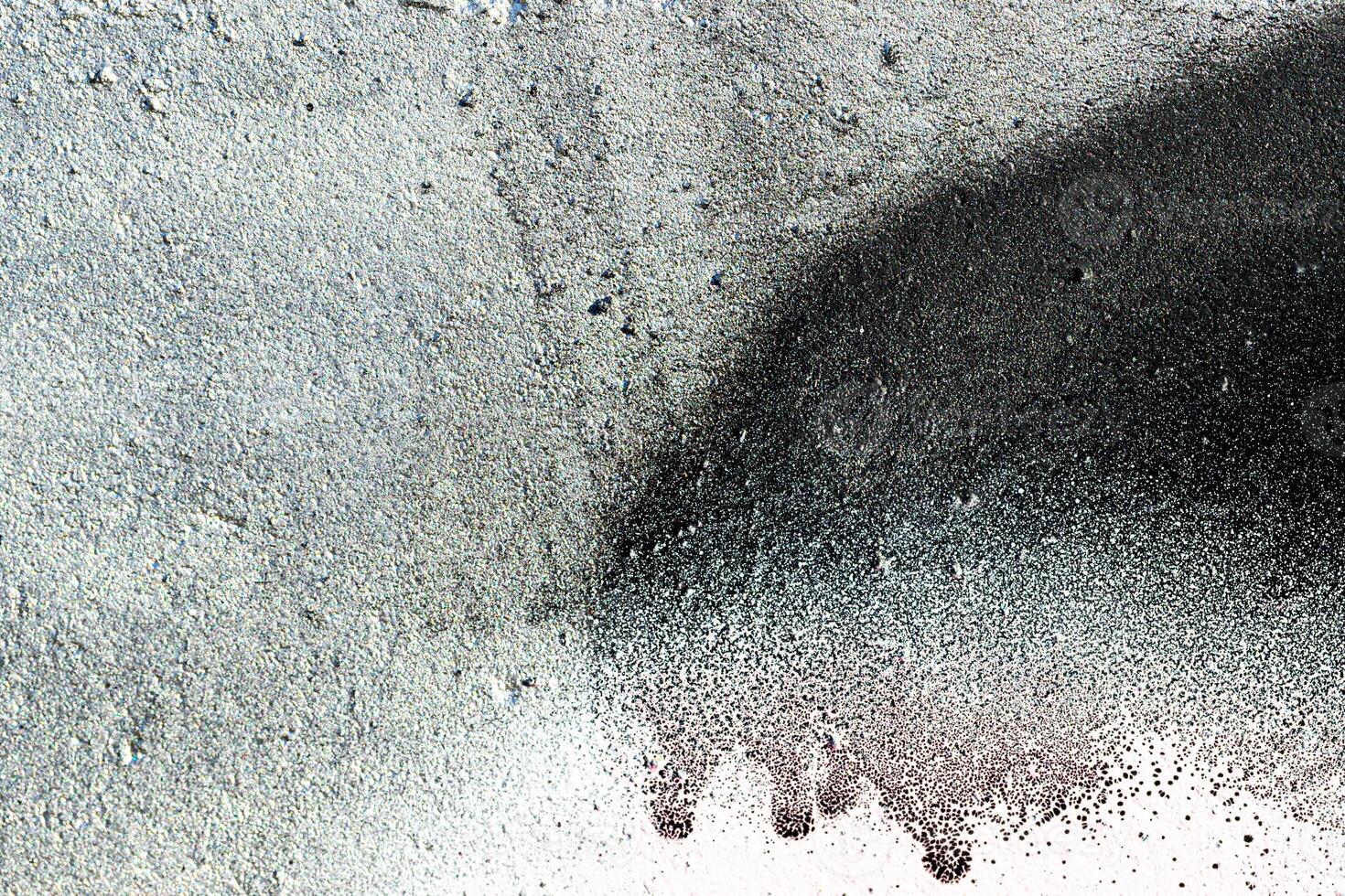 Fragment of colored graffiti painted on a wall. Abstract background for design. photo