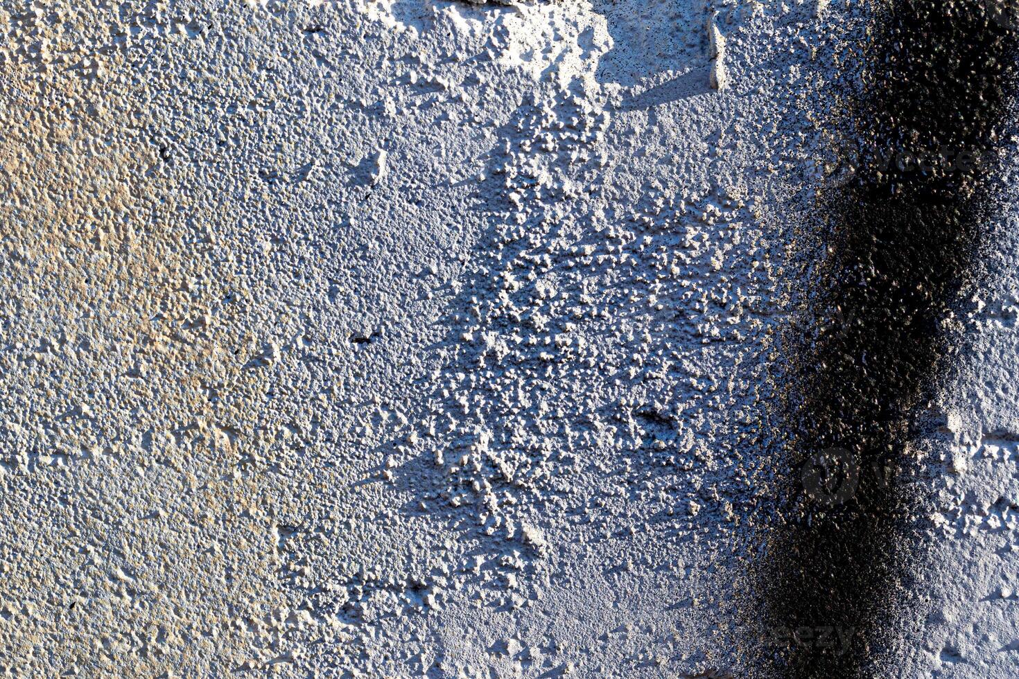 Fragment of colored graffiti painted on a wall. Abstract background for design. photo
