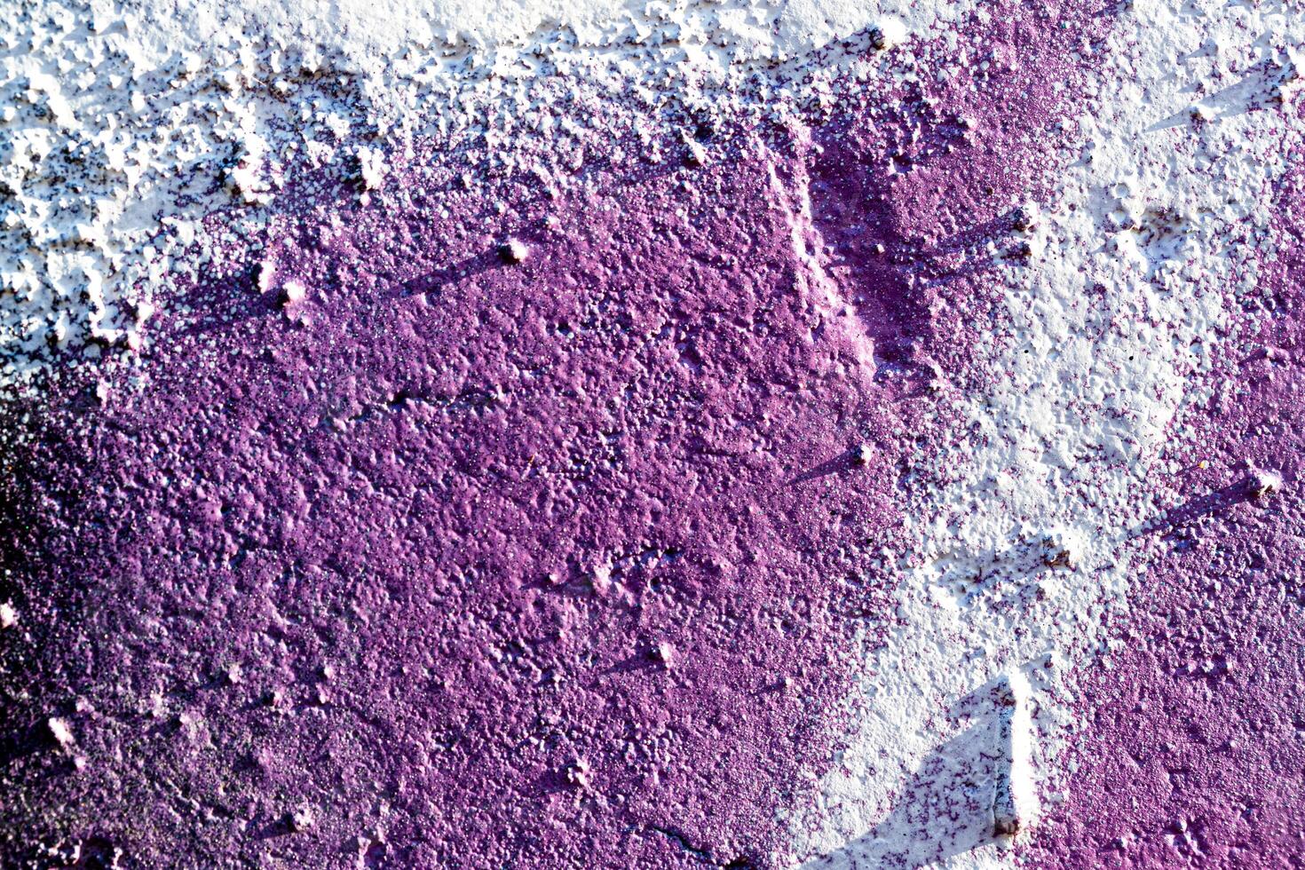 Fragment of colored graffiti painted on a wall. Abstract background for design. photo