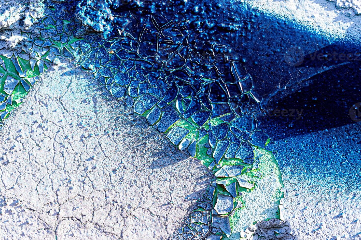Fragment of colored graffiti painted on a wall. Abstract backdrop for design. photo