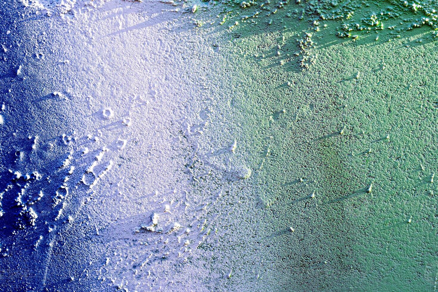Fragment of colored graffiti painted on a wall. Abstract background for design. photo