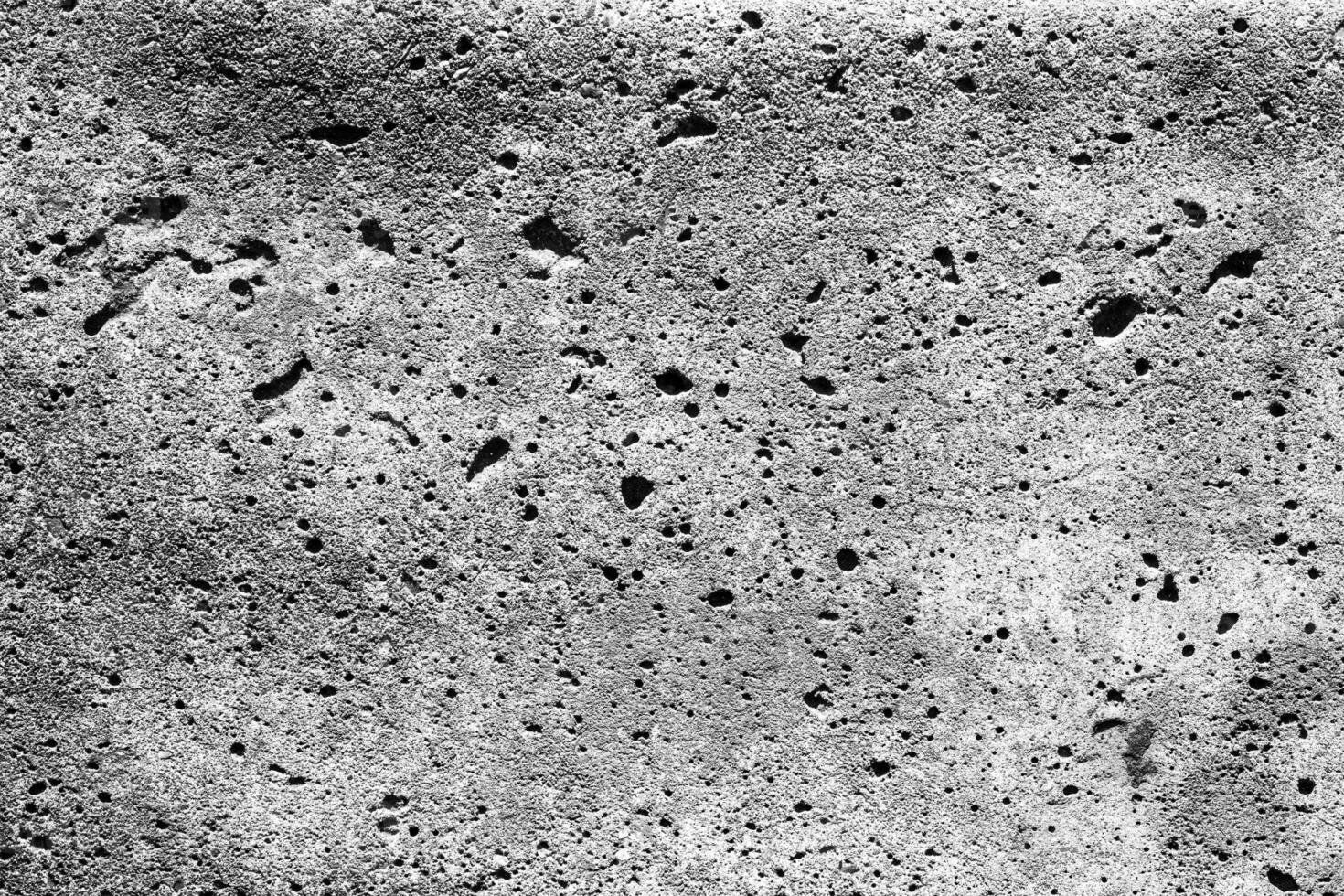 Texture of a gray concrete wall. Abstract backdrop for design with copy spase for a text. photo