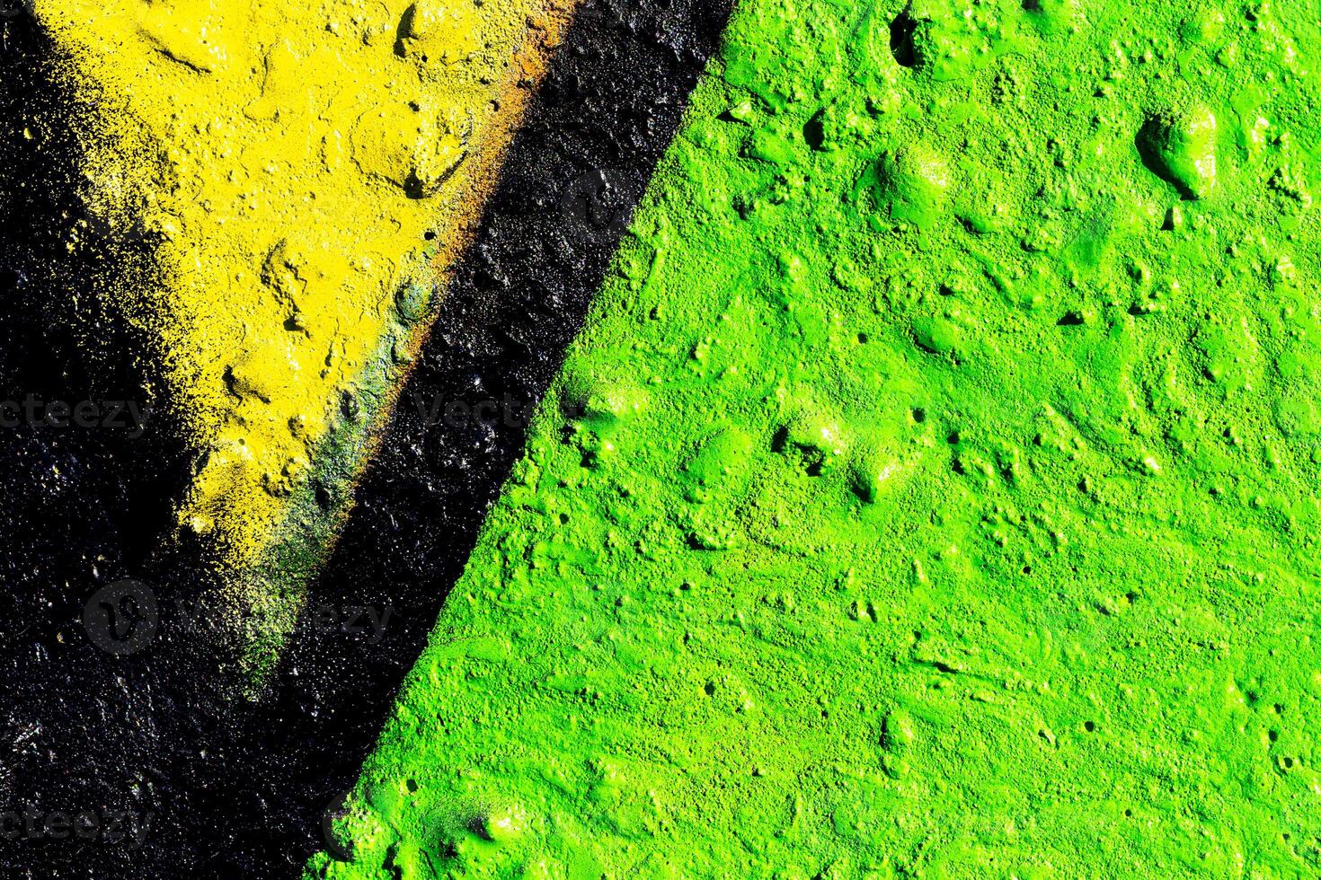 Fragment of colored graffiti painted on a concrete wall. Abstract background for design. photo