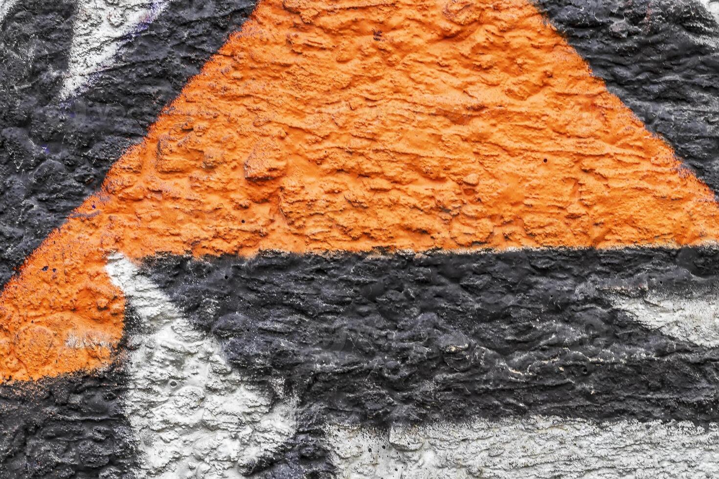 Graffiti painted on a concrete wall texture. photo